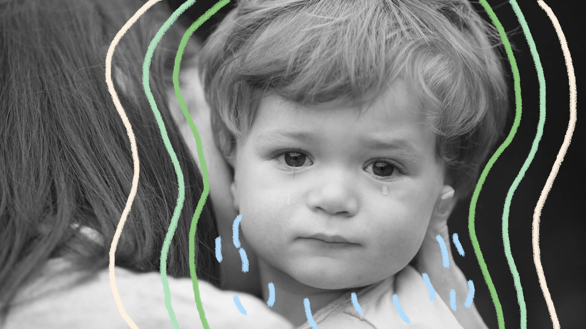 Foto em preto e branco mostra criança com lágrimas escorrendo.