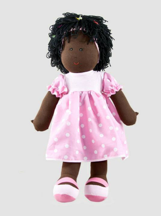 Preta pretinha bonecas de pano: foto de uma boneca de pano negra que veste vestido rosa e branco.