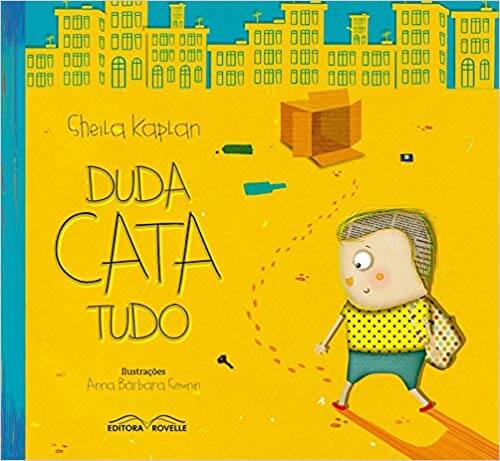 Capa do livro "Duda cata tudo", de Sheila Kaplan: uma cidade em amarelo e a menina Duda que cata objetos ao redor