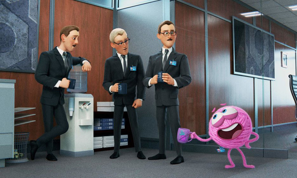  Foto de um escritório com três homens de terno, observando o novelo rosa conversar com eles