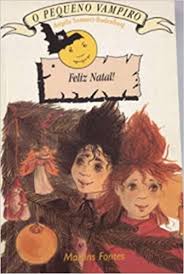  Capa do livro “O pequeno vampiro - Feliz Natal”, de Angela Sommer-Bodenburg: dois personagens de cabelos arrepiados, um moreno e um ruivo, no centro da capa