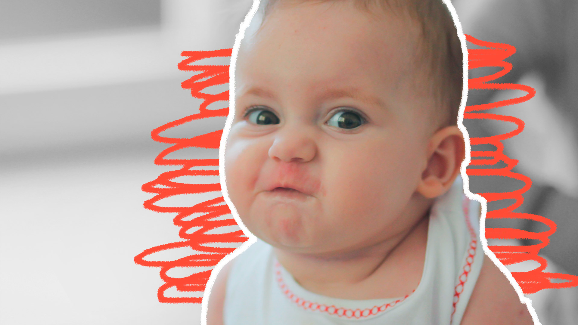 Frustração das crianças: foto de um bebê com uma expressão furiosa que olha para a câmera.