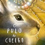 Capa do livro "O pulo do coelho", de Lázaro Ramos. O perfil de um coelho aparece em tons de amarelo e dourado