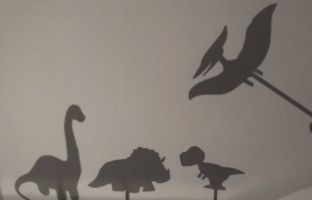 sombras jogos com quadrinho pré-histórico dinossauro personagens