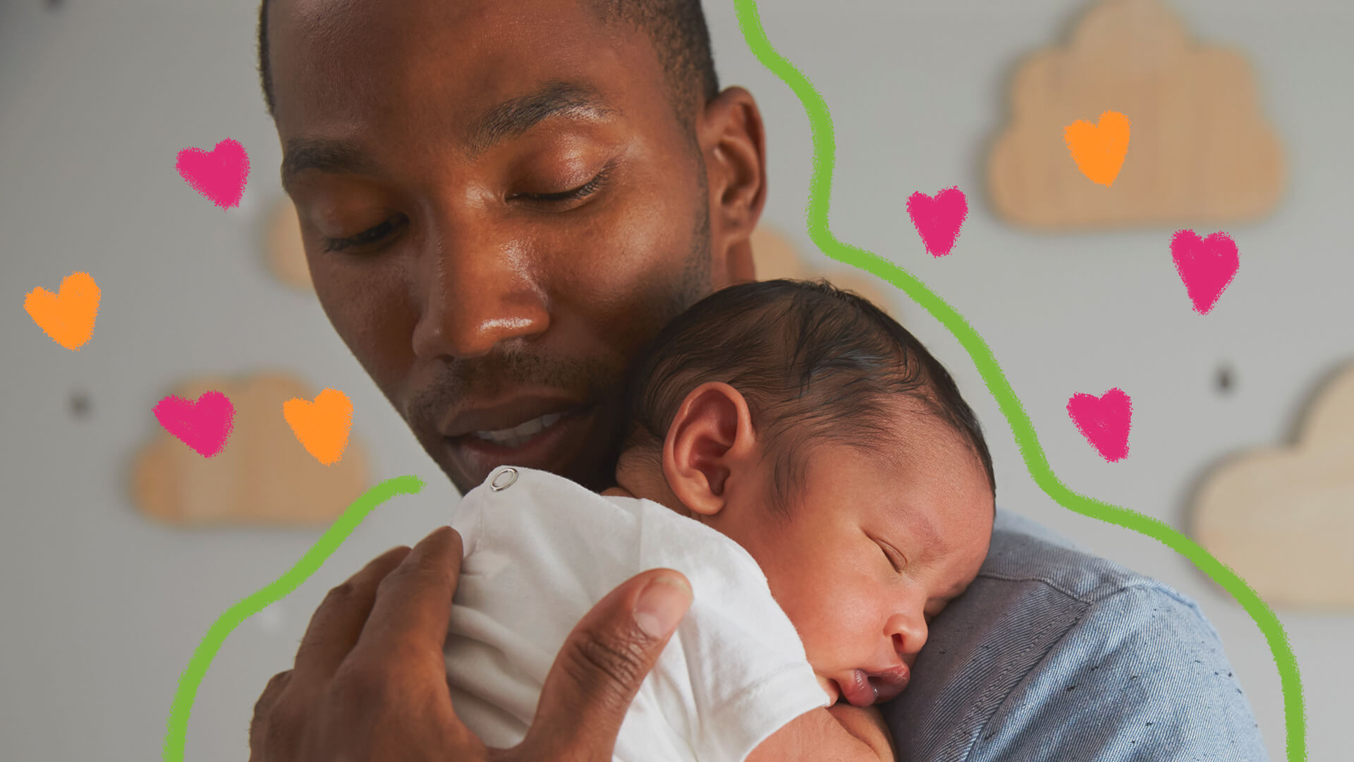 Um adulto e um bebê de colo, que tem o rosto apoiado no ombro do homem. Ambos são negros.