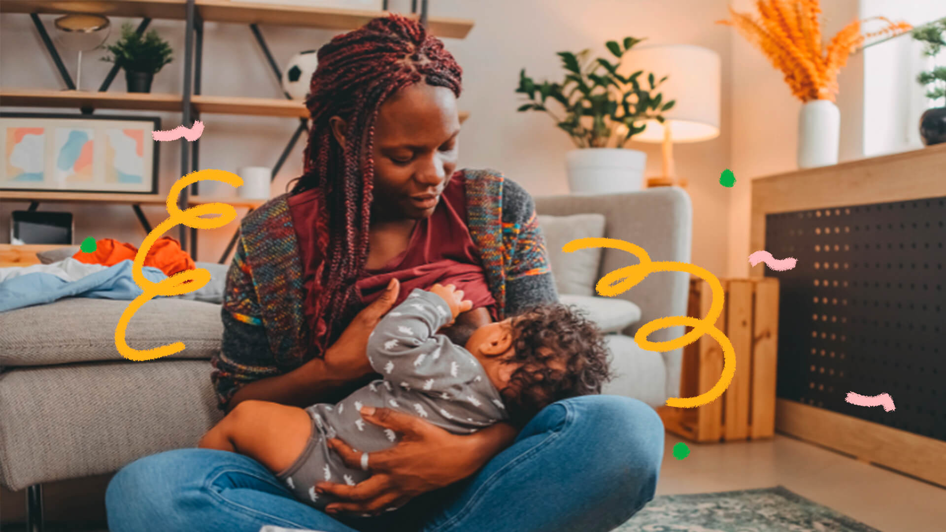 Na imagem, uma mulher negra amamenta sua criança. A foto ilustra uma matéria sobre lactivismo.