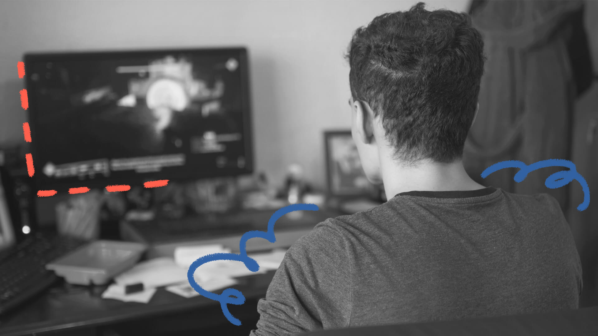 Foto em preto e branco de um jovem de costas sentado em frente a um computador. A matéria é sobre a geração do quarto
